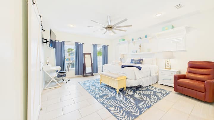 Master bedroom with king bed and desk + TV (sleeps 2)