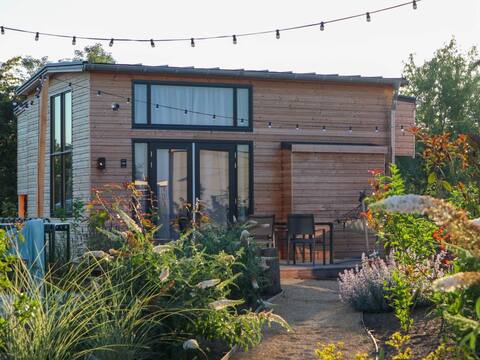 Nice tiny house with pellet stove in holiday park