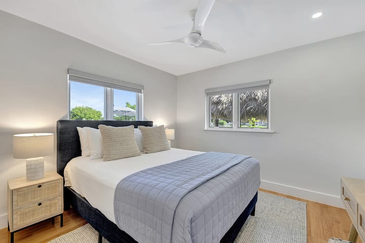 Queen Bedroom facing pool and tiki hut