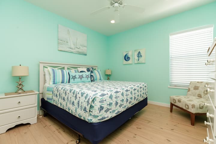 Bedroom #1 with queen bed and attached en-suite bathroom