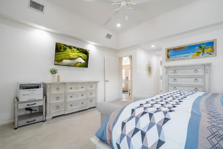 Master Bedroom suite has a beautiful tray ceiling,  dresser, chest of drawers and 2 night stands . (Copier/printer only available on request in advance at booking for a work stay /office package) , 50" Sony 4K UHD G@@gle smart TV w/ROKU and streaming