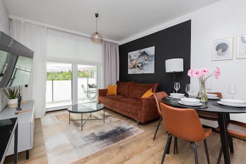 Popular Airbnb listing: Modern Apartment | Balcony and Underground Parking in Ujeścisko łostowice