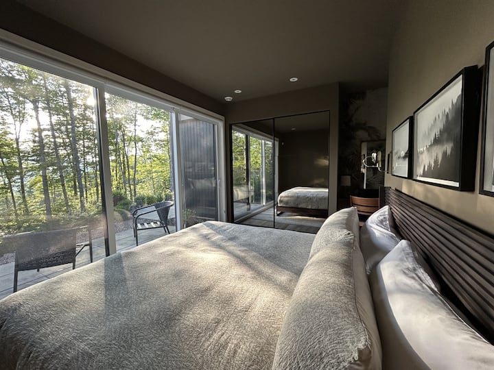 Bedroom #1 King sized bedroom with walk out terrace, large wardrobe, desk and ensuite bathroom 