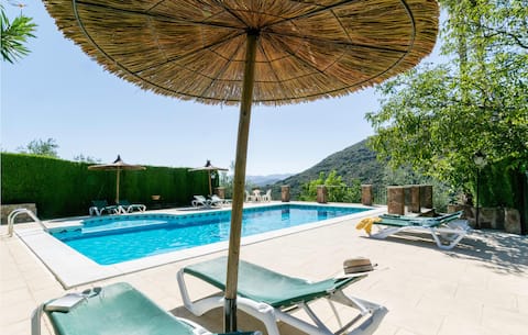 Nice home in Carcabuey with house a mountain view