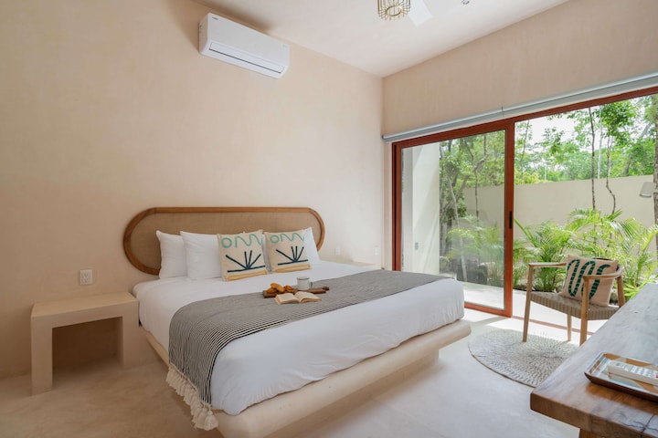 Another bedroom with a cozy feel and natural-themed decor.