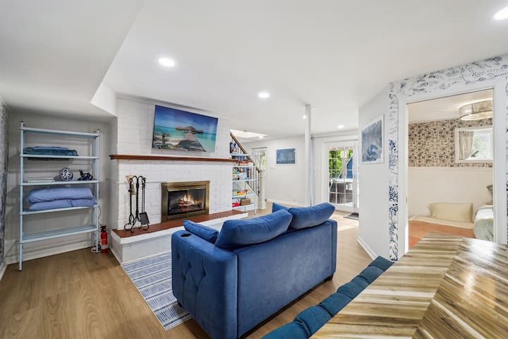 Cuddle in front of the electric fireplace with a hot cocoa or catch the latest show on the 50” Roku TV in the basement