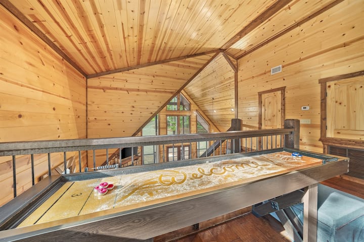 Enjoy a fun game of shuffleboard in the loft with your friends and family.