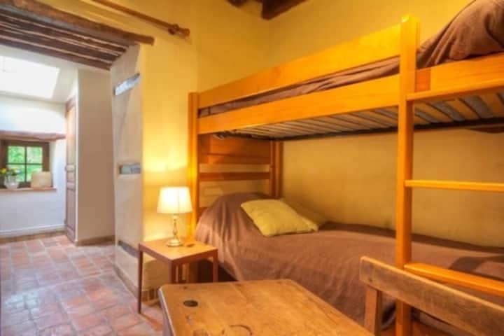 Habitación de paso en la planta baja para 9 personas