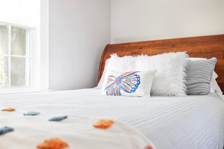 A plush queen bed for ultimate comfort.