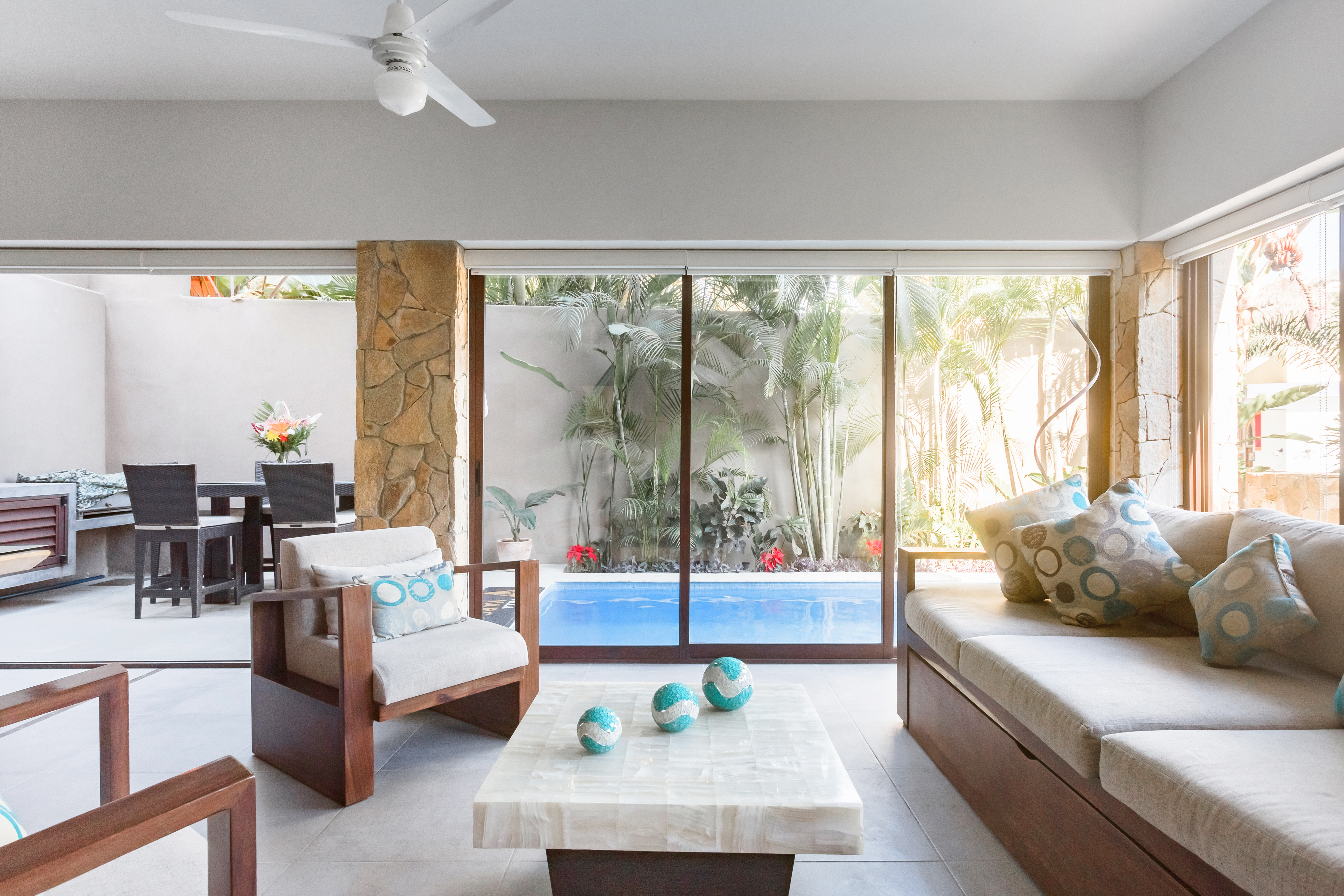 Modern Pool Home with Thatched Balconies and Garden Terrace