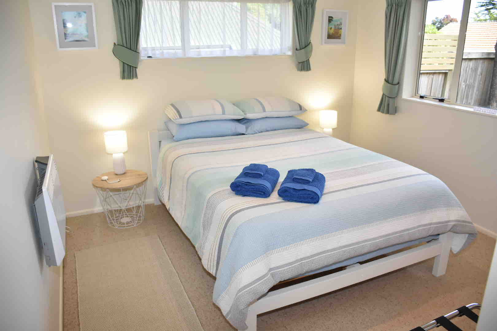 Cheerful, private downstairs guest suite.