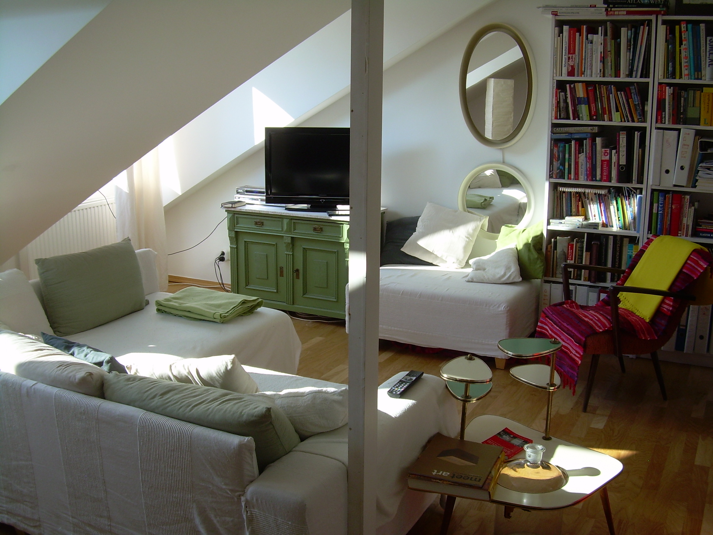 double bed and 2sofas next to Opera