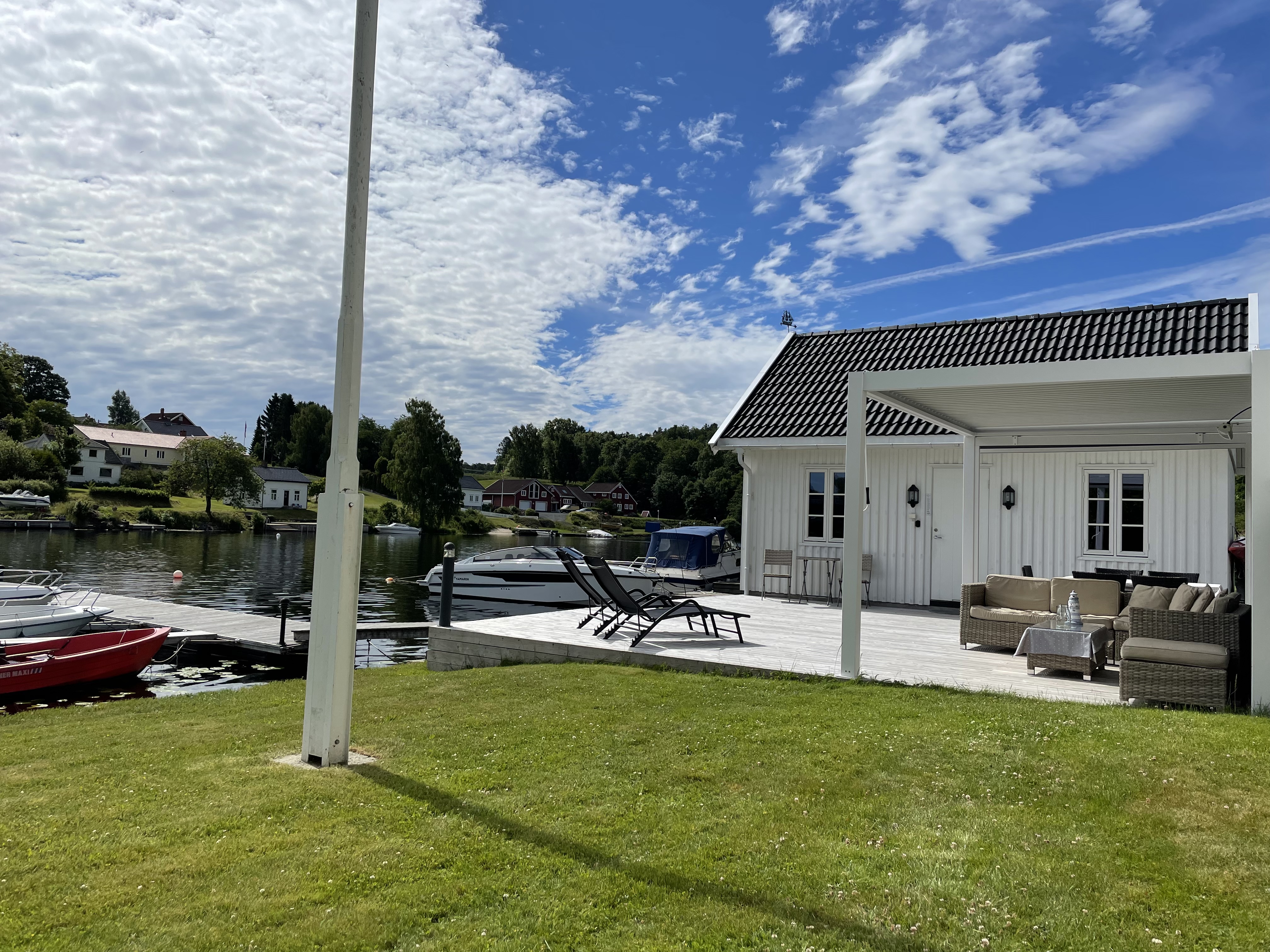 Idyllic cabin by the water with canoe and kayak.