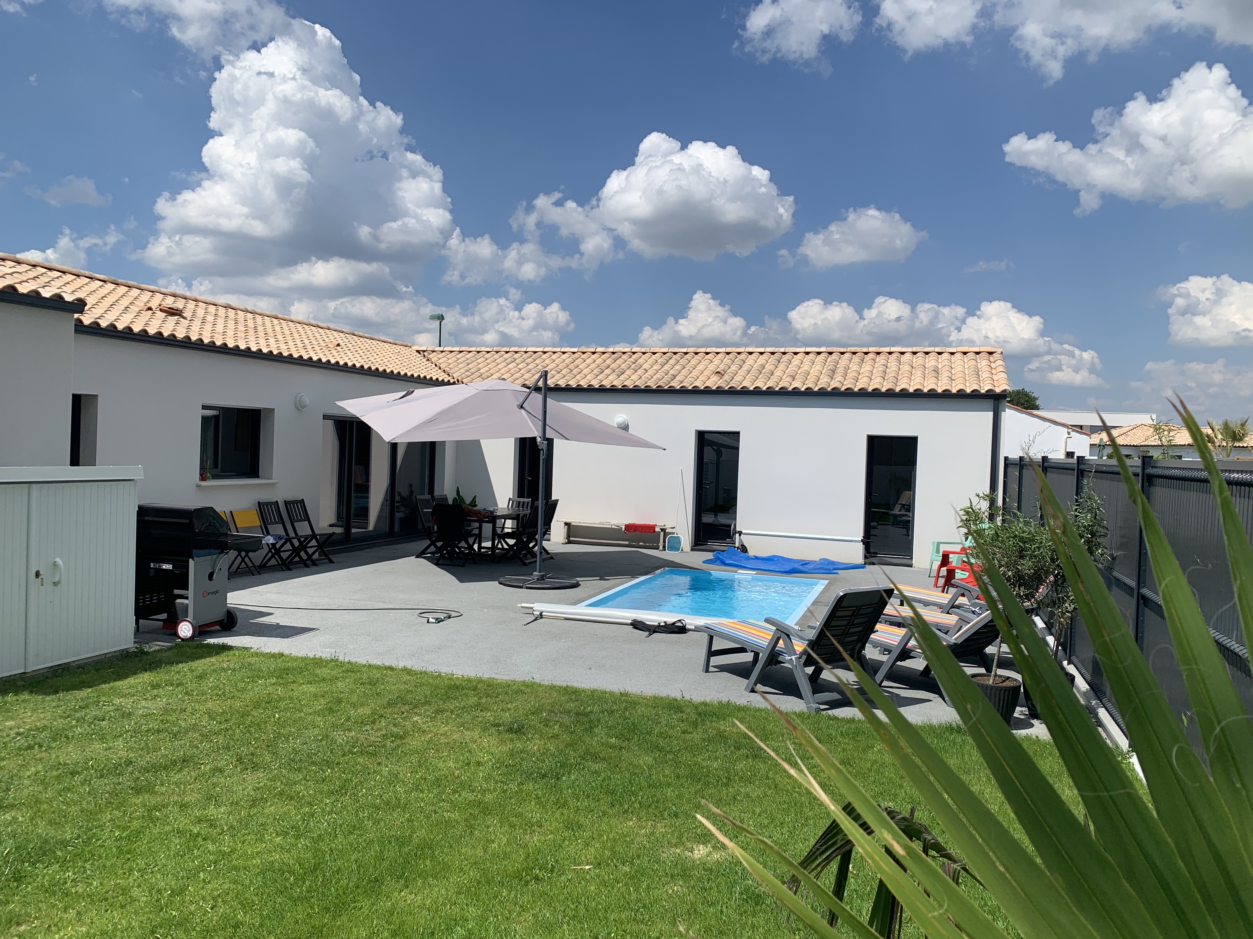 House with pool near ocean