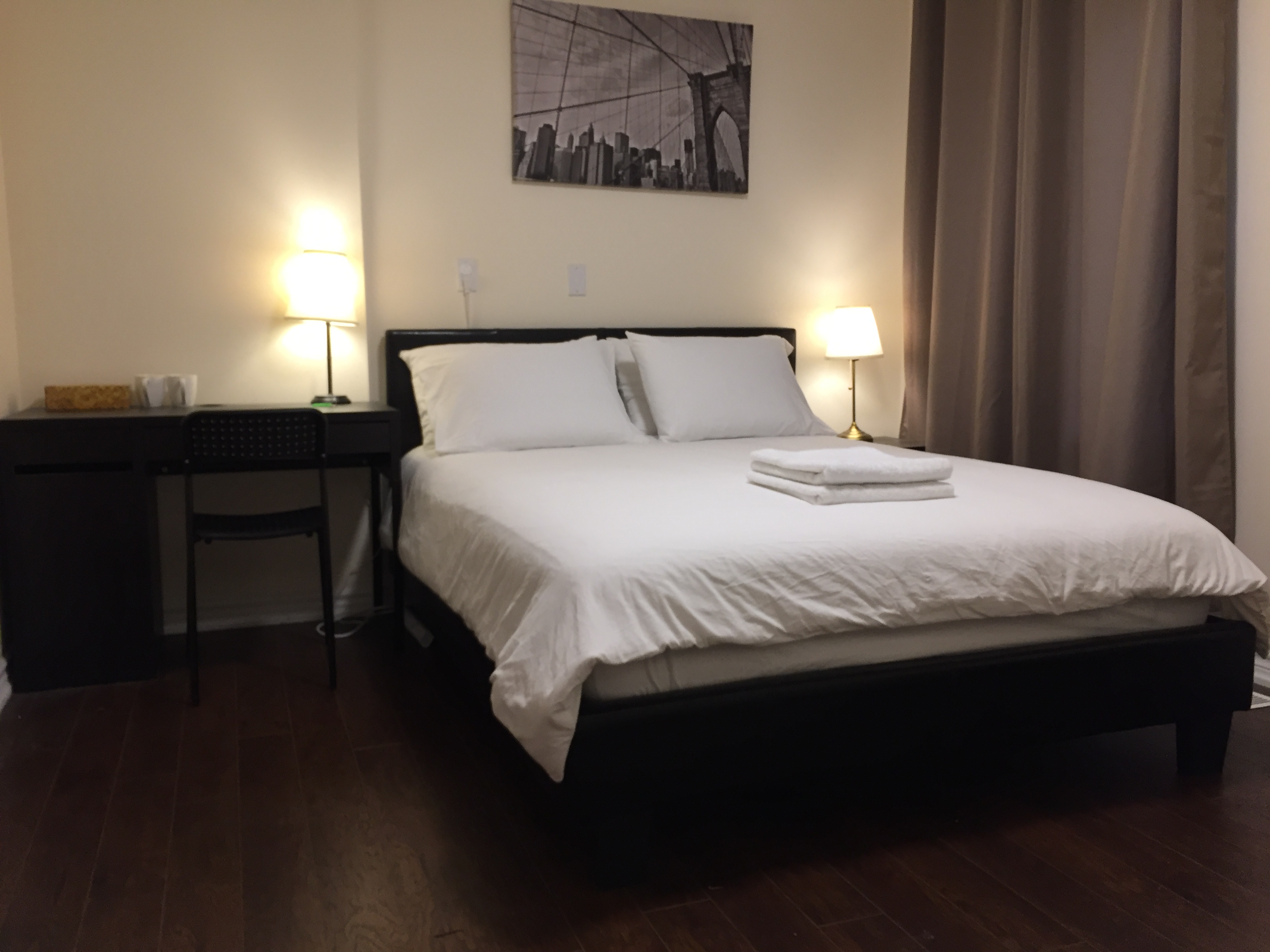 One queen bed with a private bathroom by subway