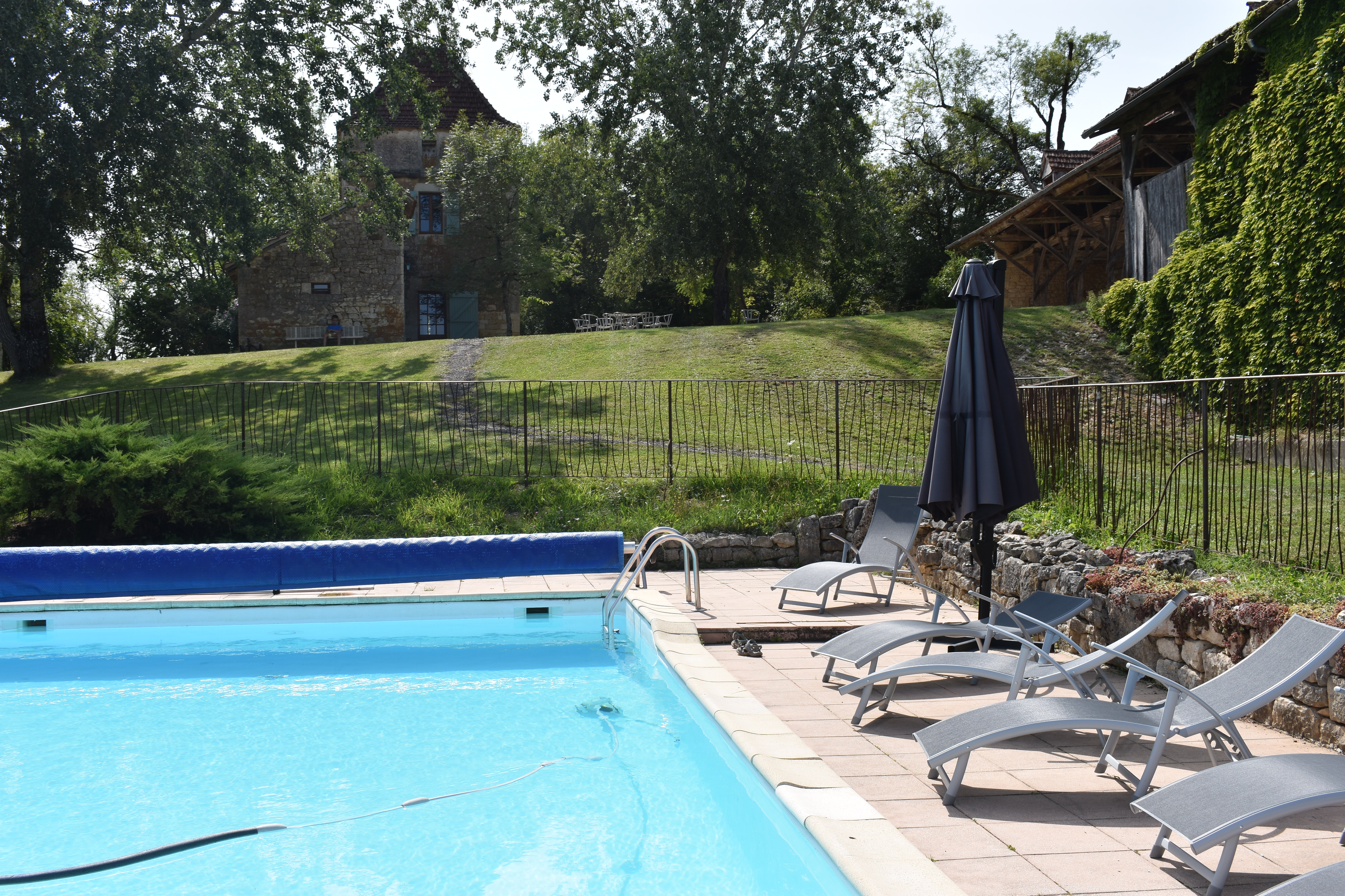 Old farmhouse with outbuilding and swimming pool