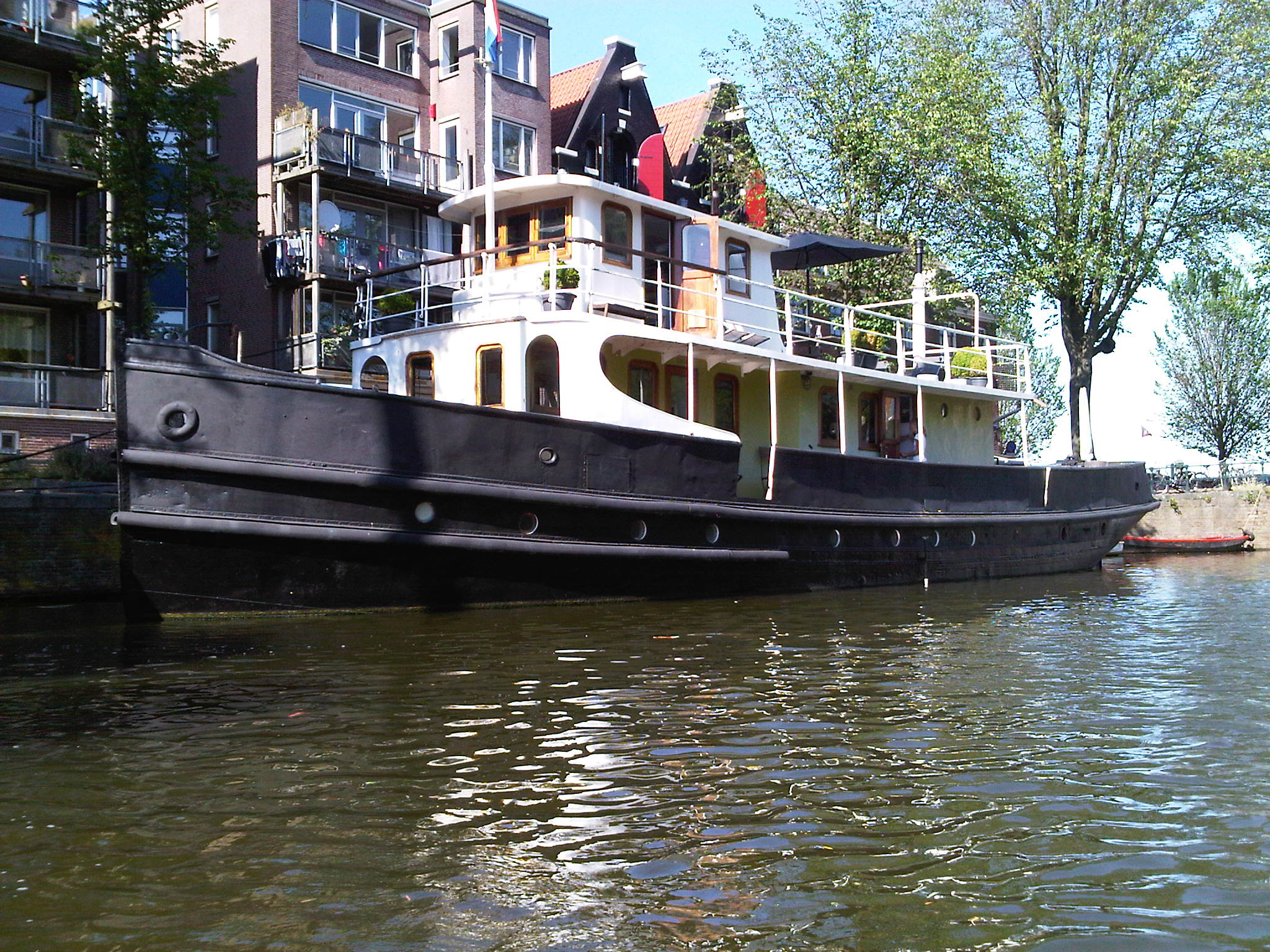 Historical ship on an astonishing spot โ Amsterdam stay