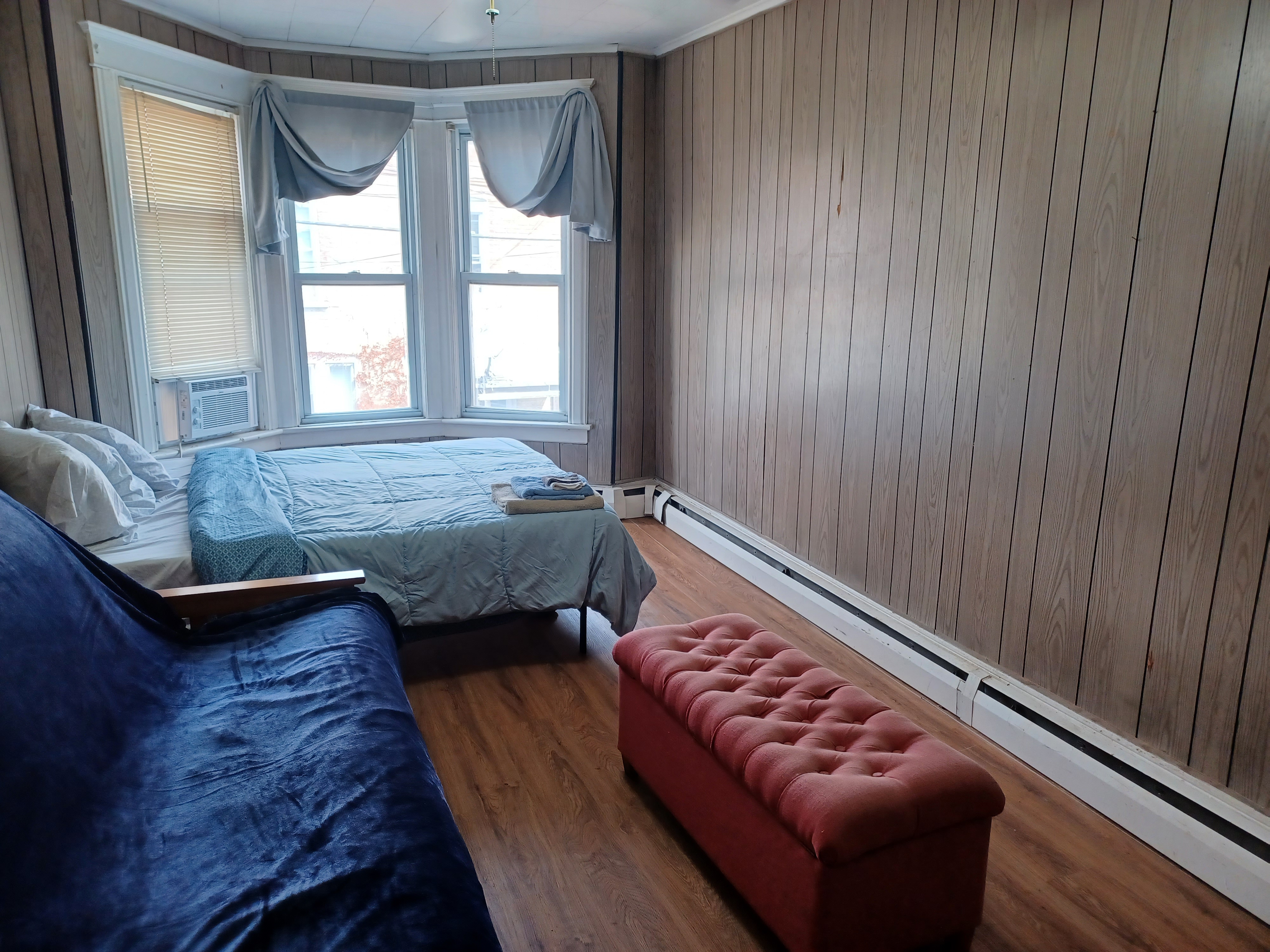 The backroom with TV, Queen bed and extra futon in ELEVENTH WARD, Albany