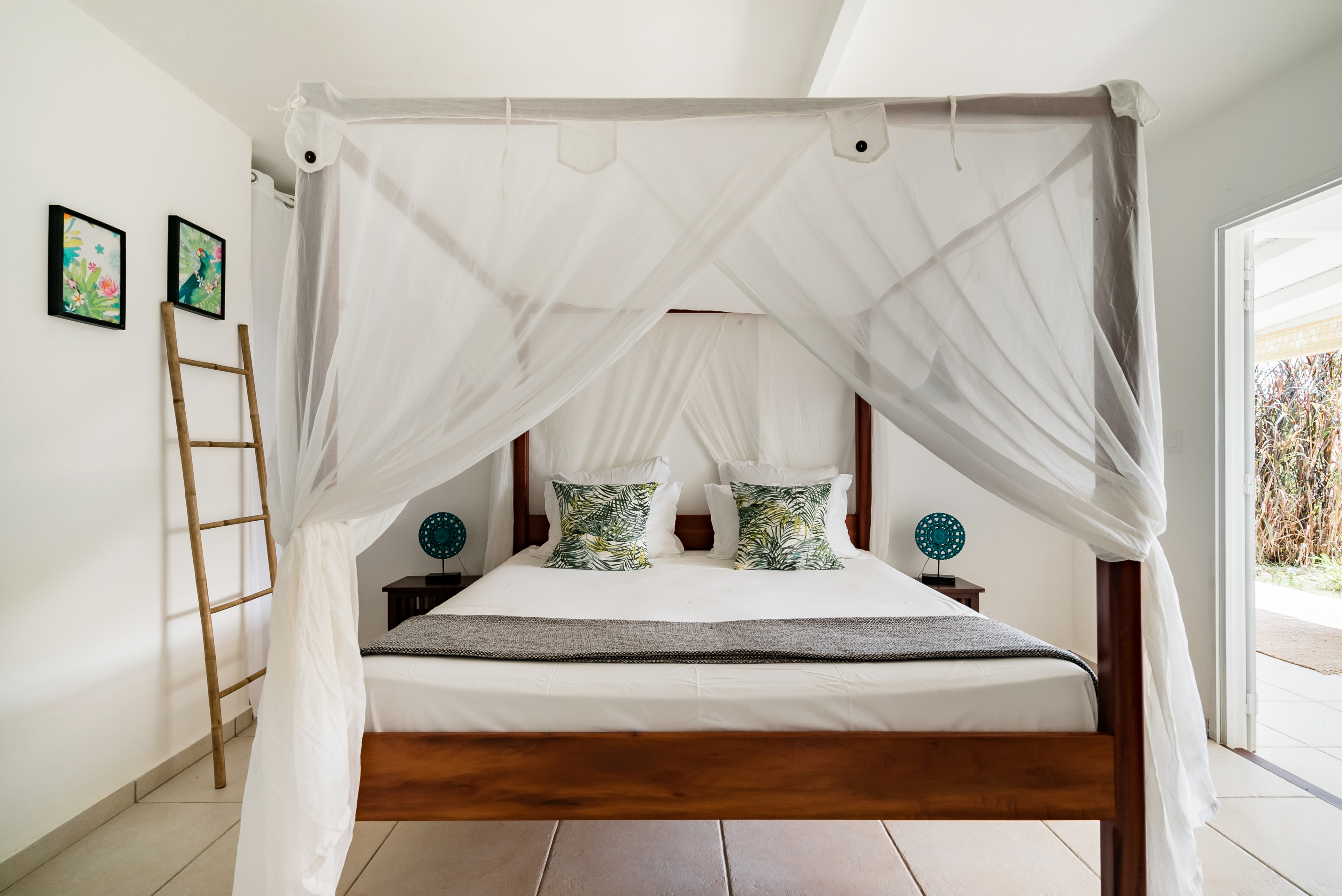 Stay in the heart of a natural sanctuary - king-size canopy bed