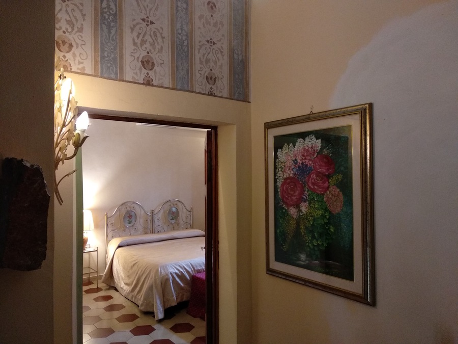 Large double bedroom with frescoes