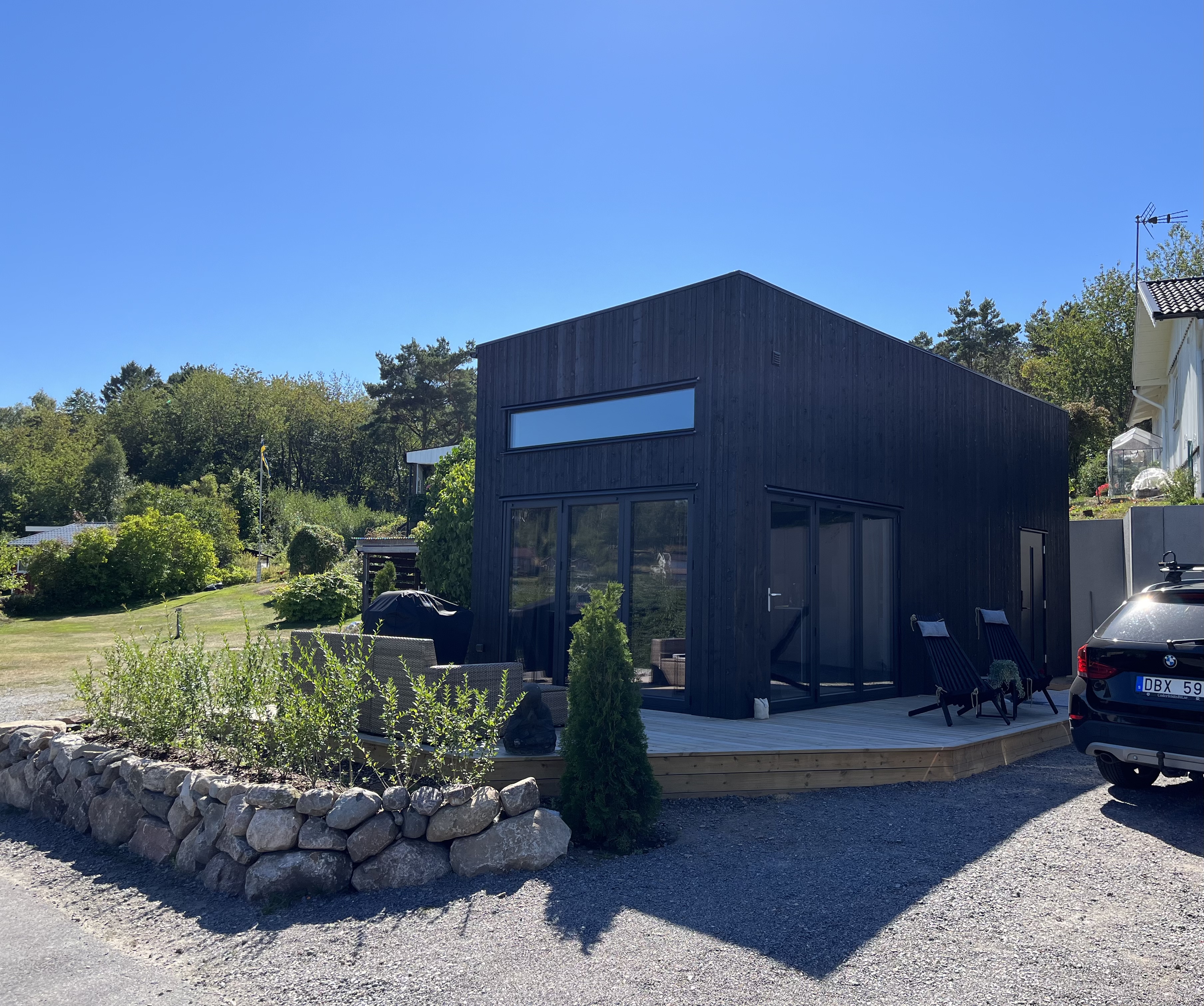 Newly built Attefall house in a rural setting .