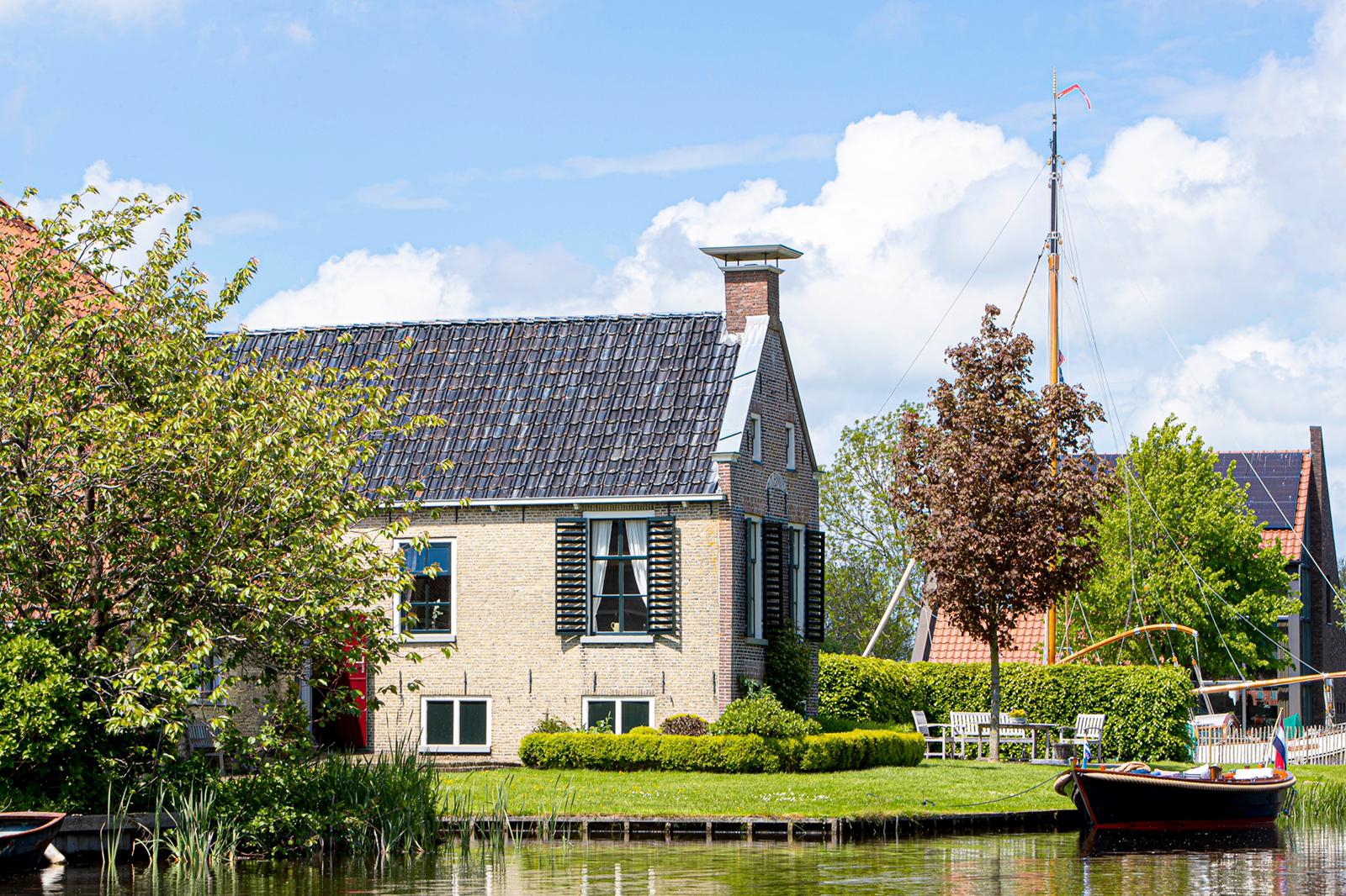 Unique vacation home on open water Friesland Houses for Rent in Broek