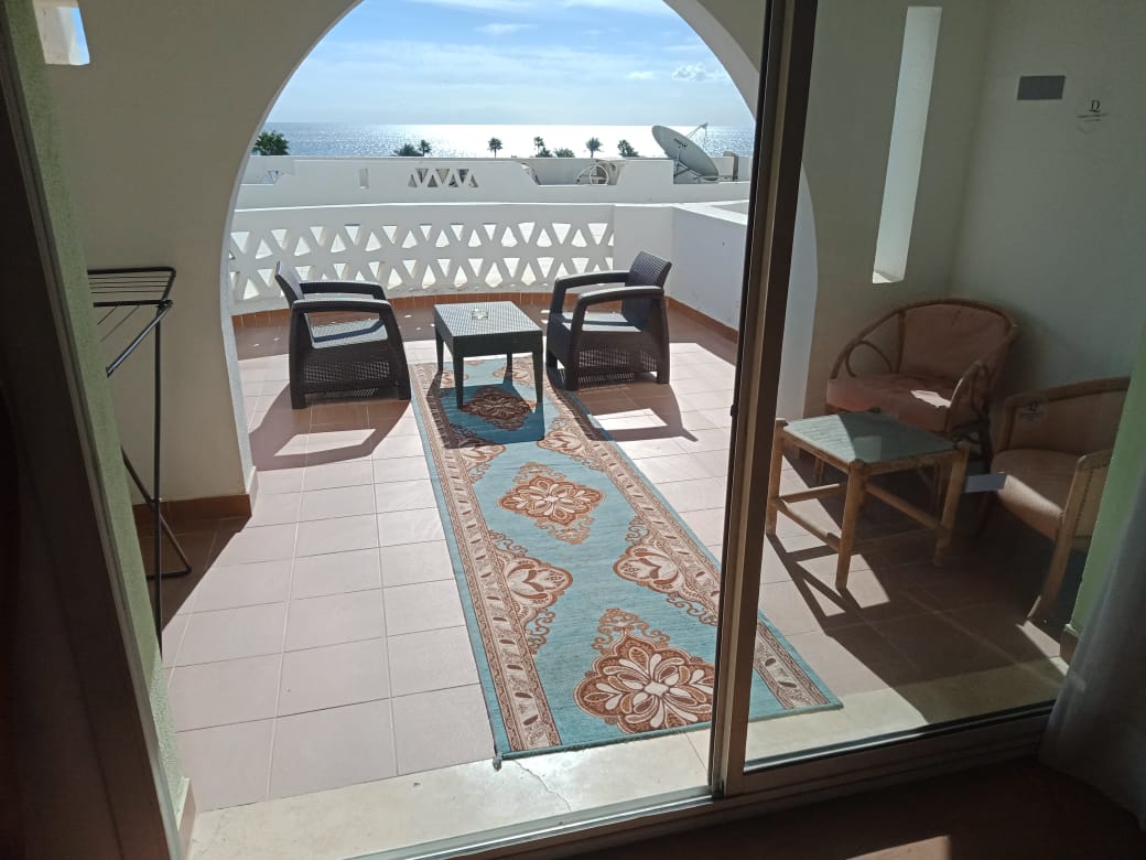 Apartment with a patio overlooking the sea