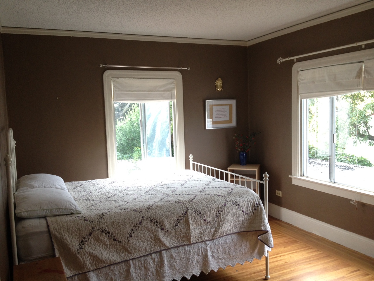 Sunny bedroom w/ Tuscan patio view in Sausal Creek, Oakland