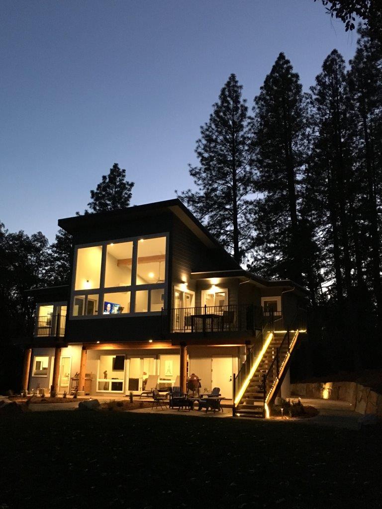 New contemporary home overlooking Rollins Lake.
