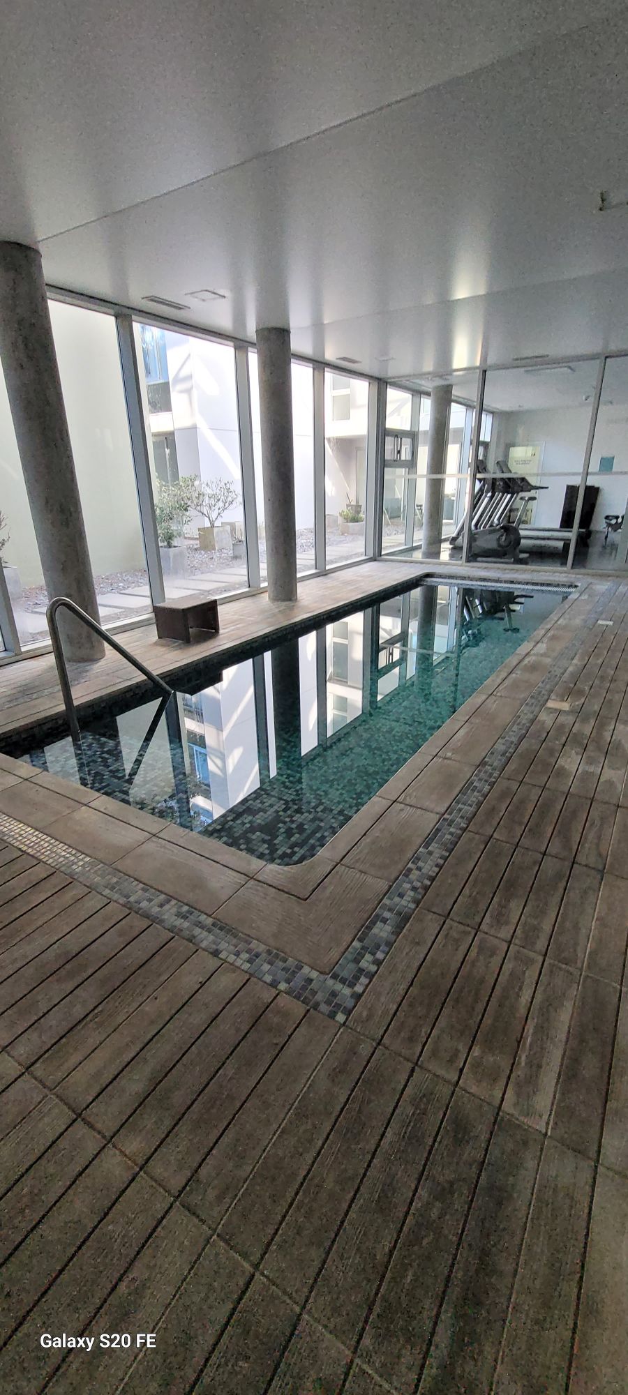 Apt in building with pool