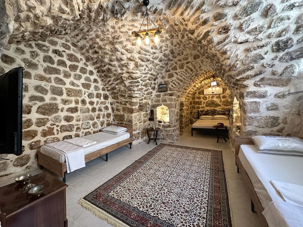 stone house and mustakil house. spur han mansion