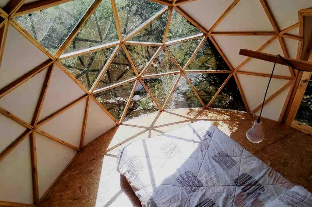 Dome Gaque, surrounded by nature.