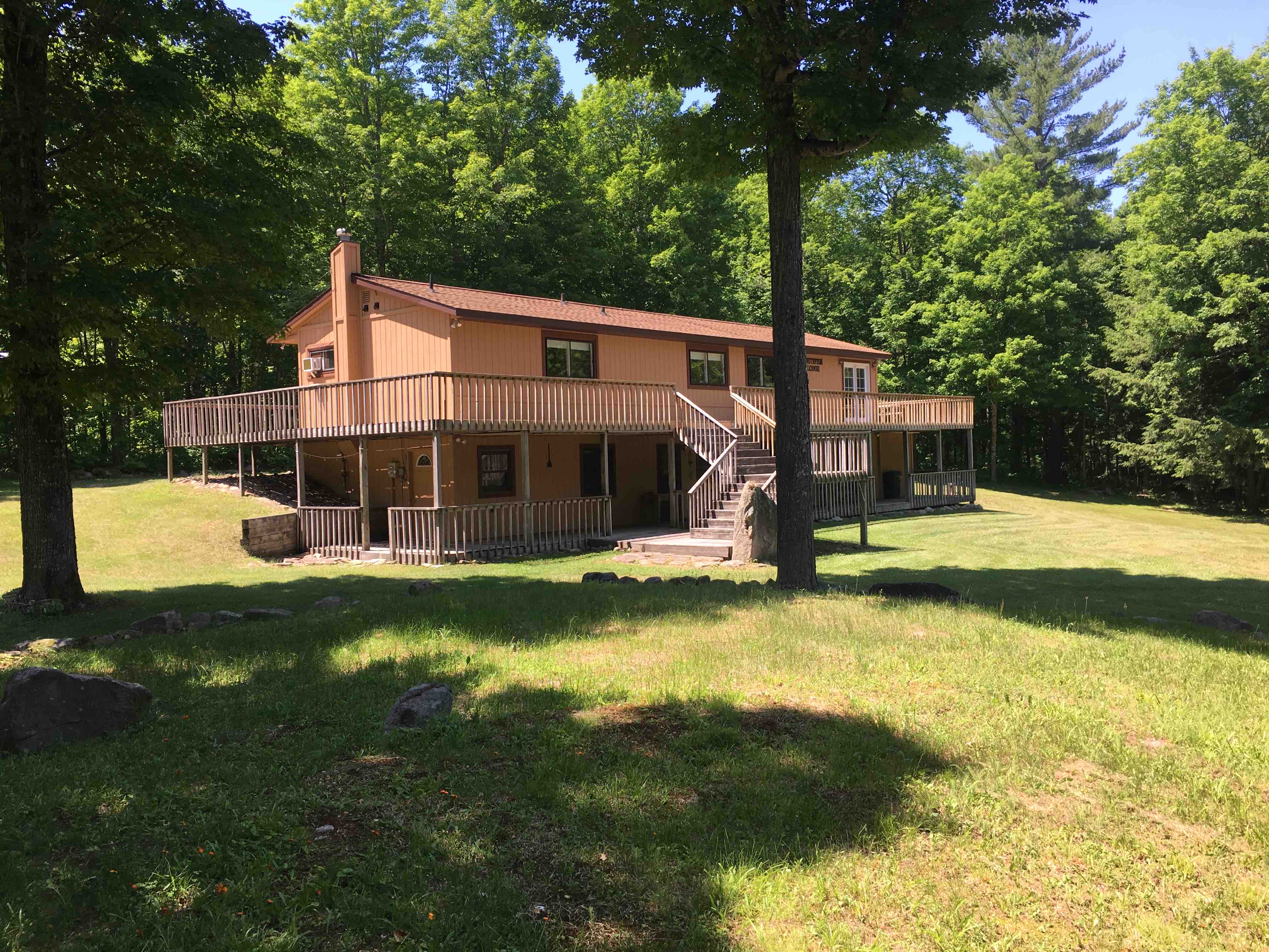 Whitefish Lodge on the Laughing Whitefish River Houses for Rent in