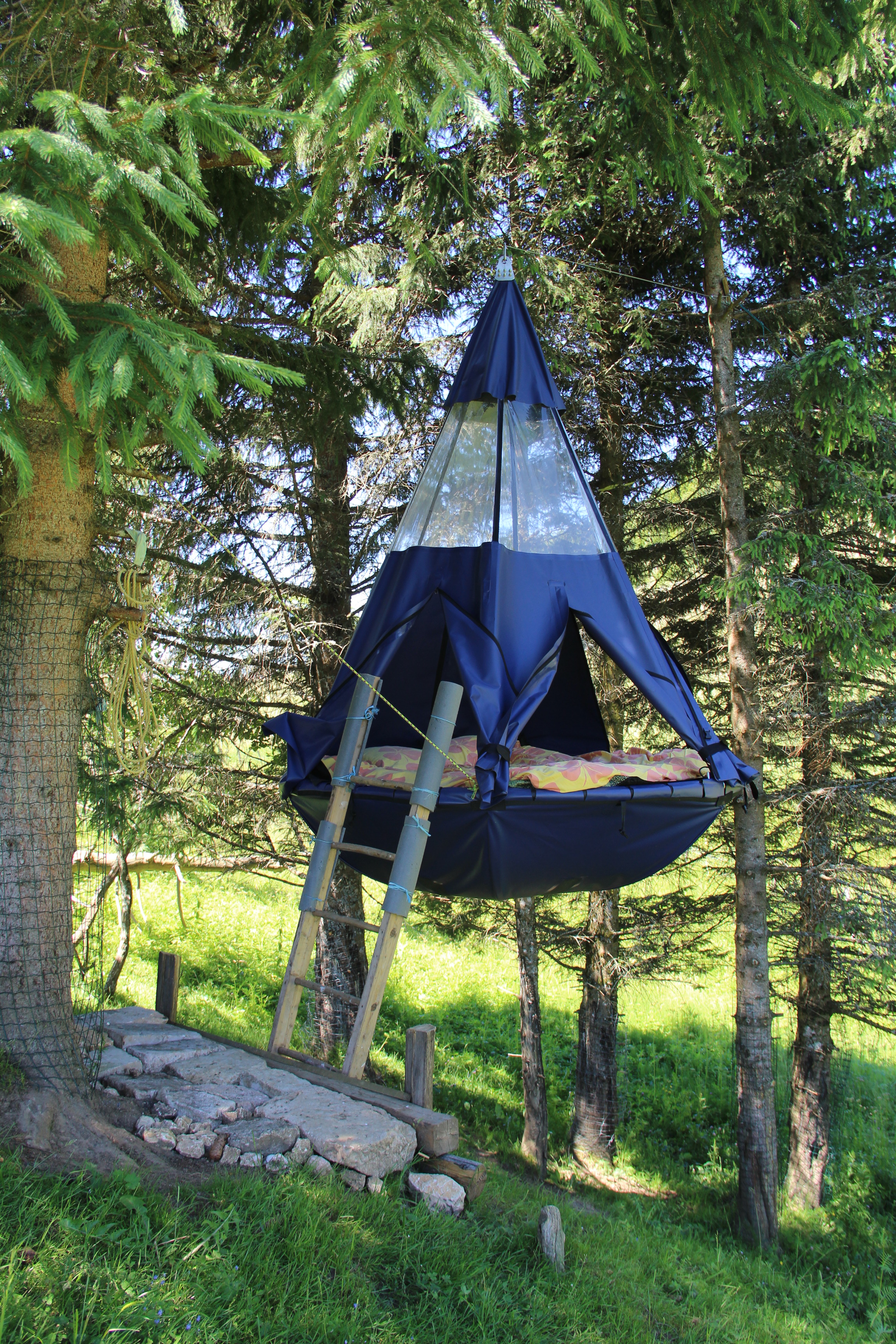 The PANDOLA, hanging tent IN the trees.
