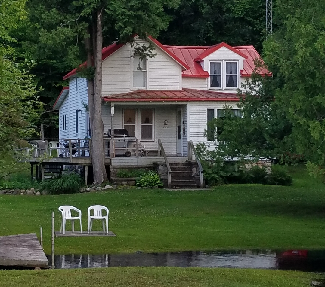 Charming Red Roof Farm House Houses for Rent in Alden, Michigan