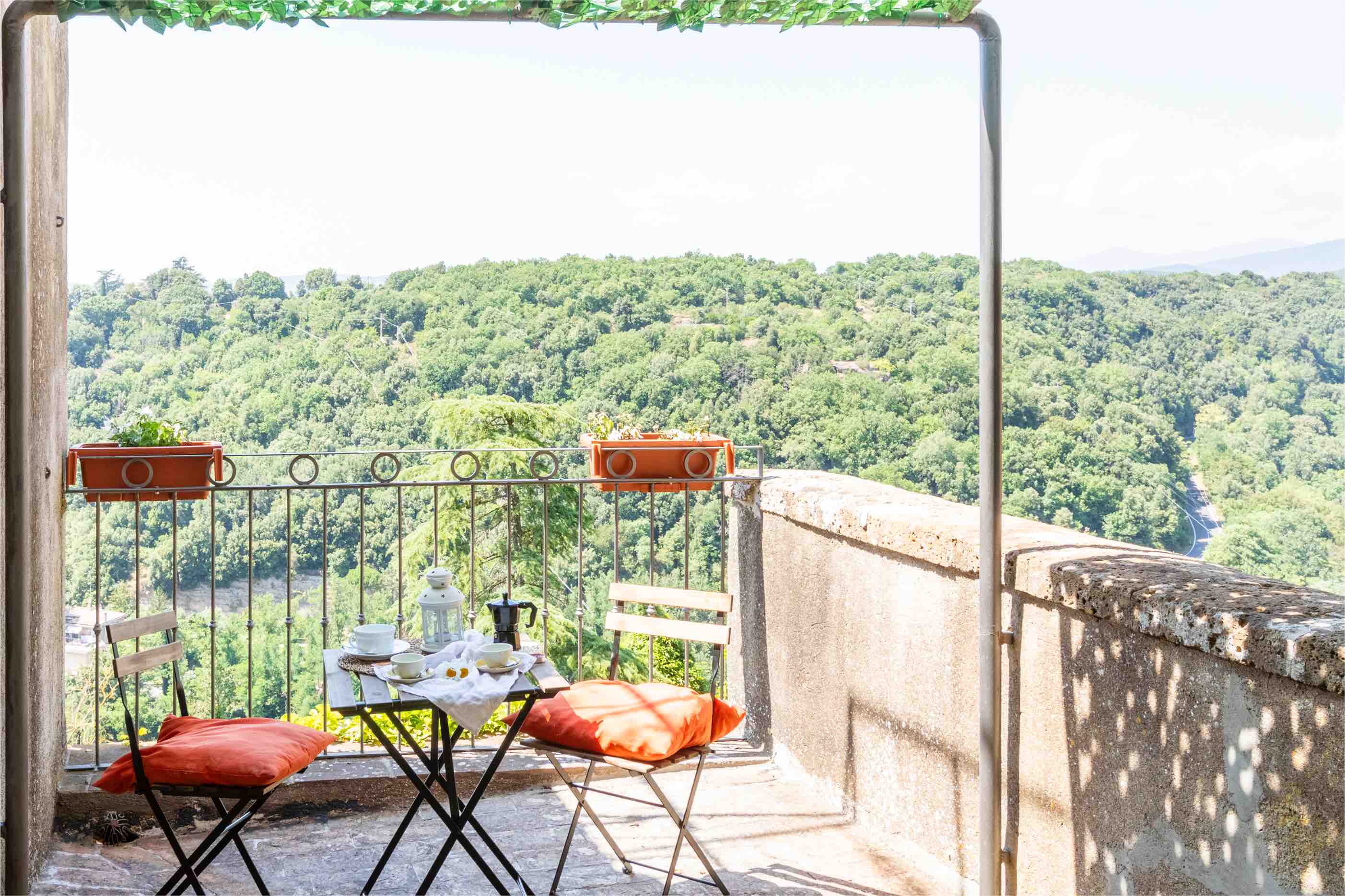 House balcony in the room overlooking the valley