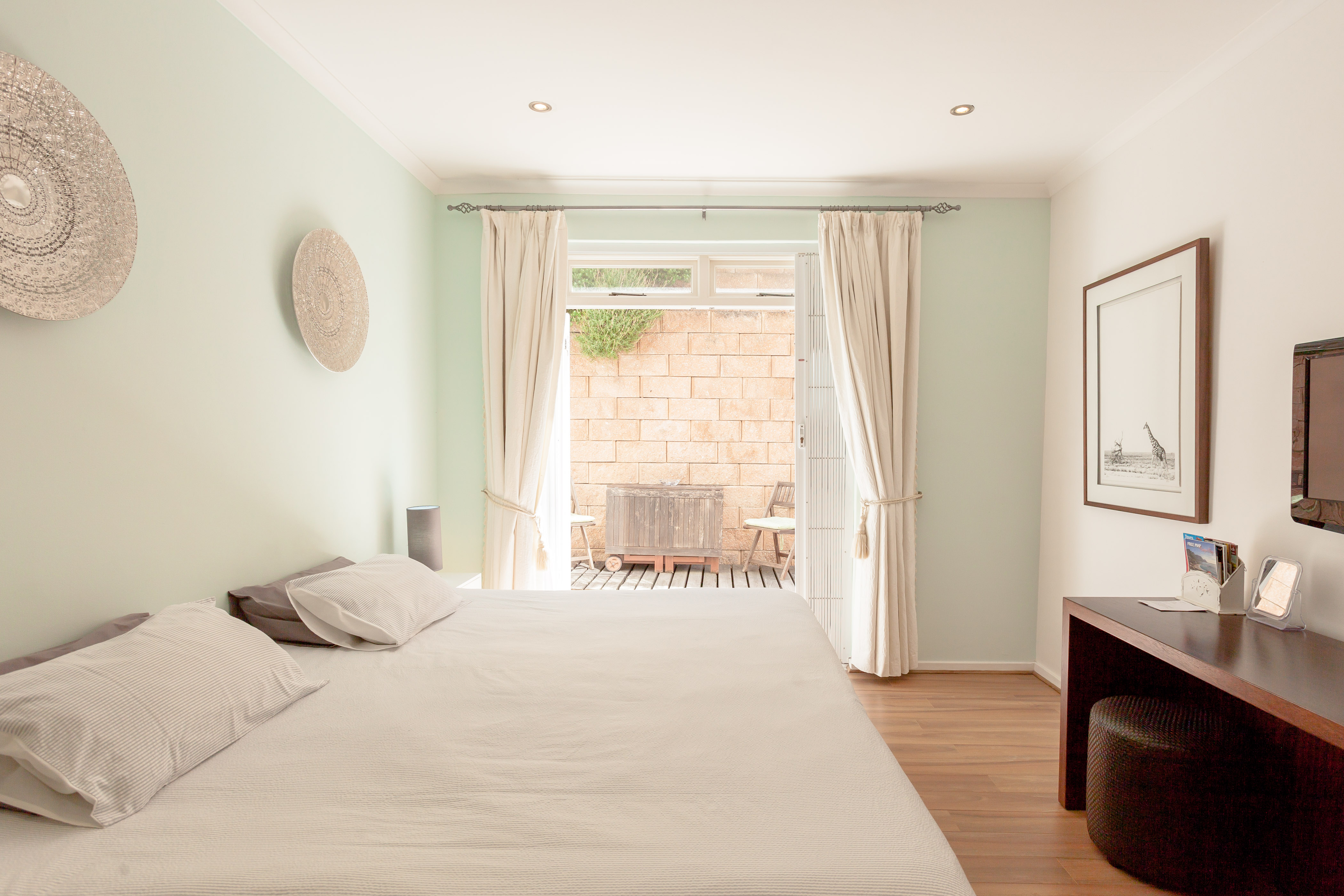 Walk to Camps Bay Beach from a Bright, Chic Home