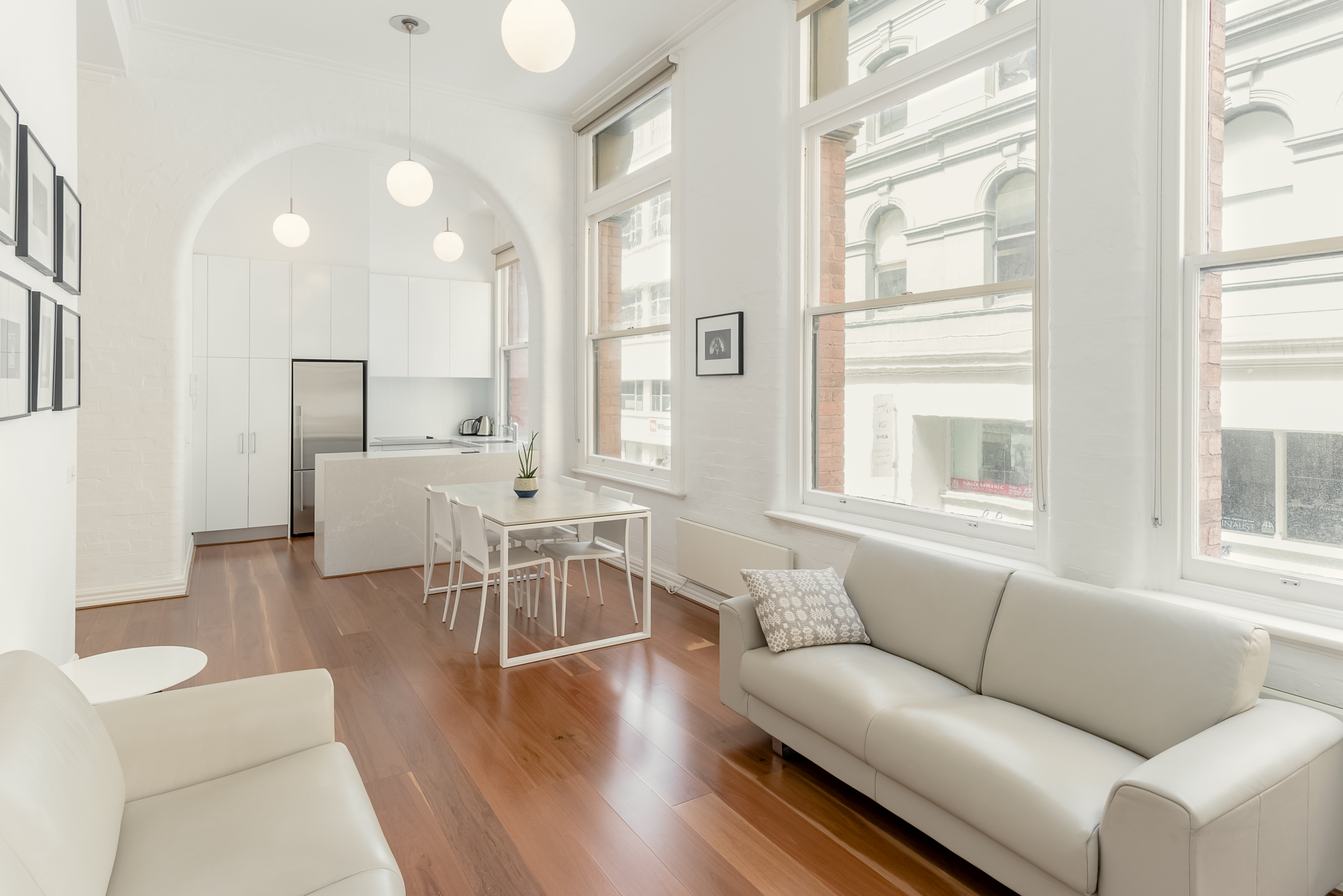 Visit Fashion Houses from an Airy, Minimalist Flat