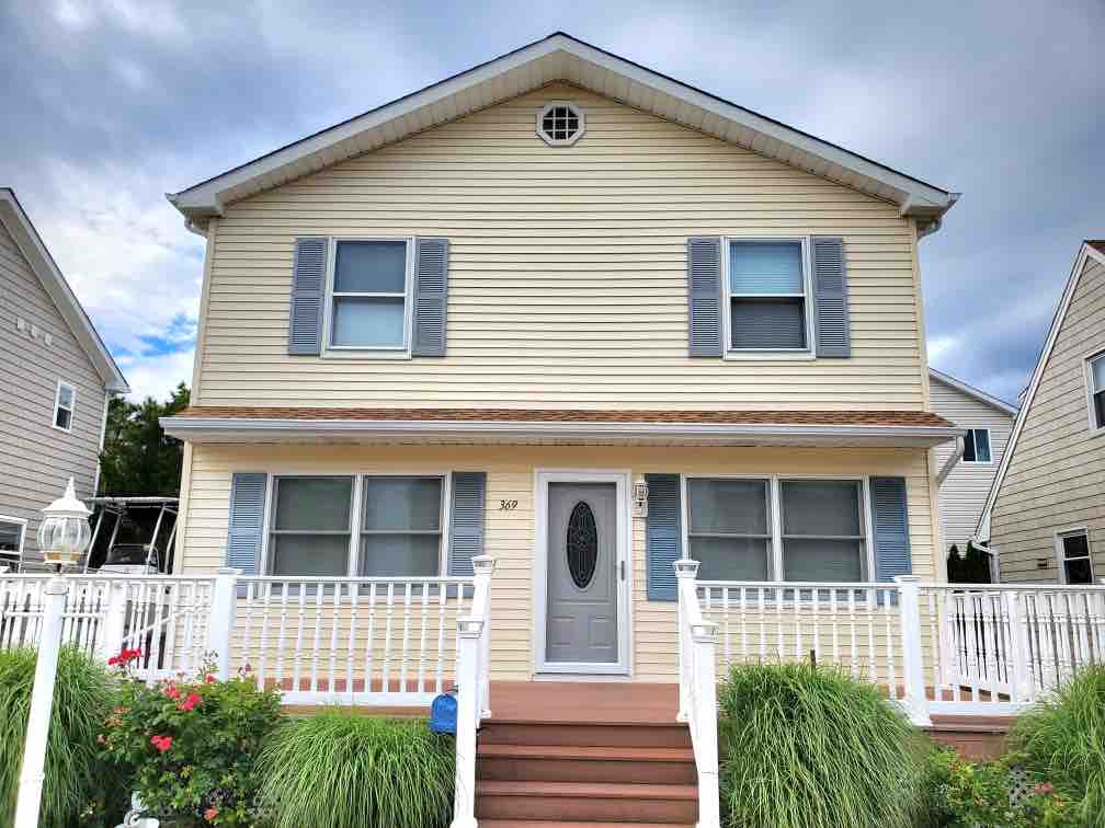 Bayside 6-bedroom home with partial water views
