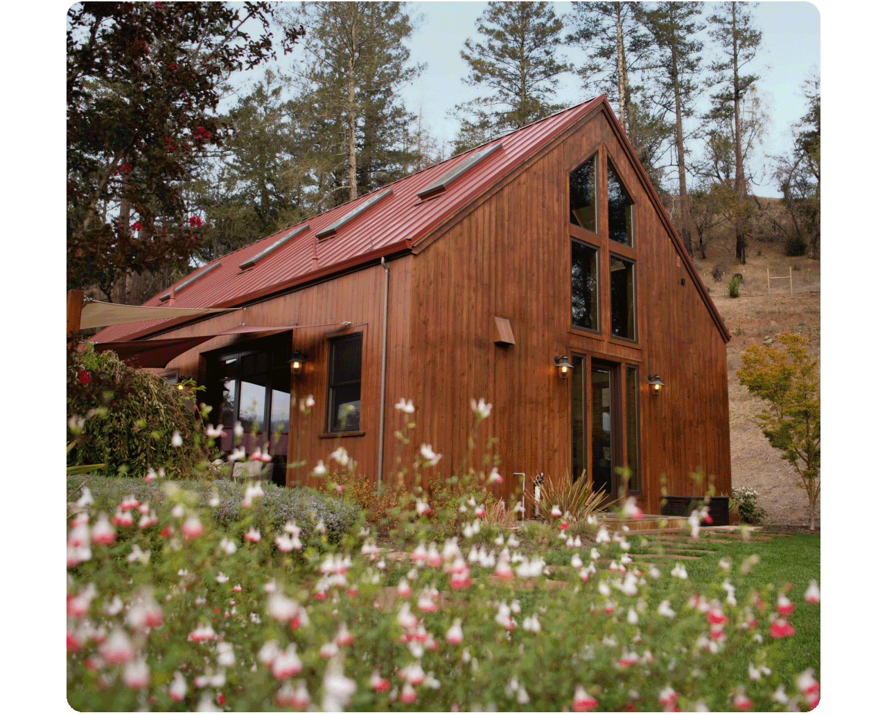 An animated .gif cycling through three images of a cabin near a field of wildflowers, a group of friends sharing a picnic on a blanket, and two women on a dock overlooking a lake.