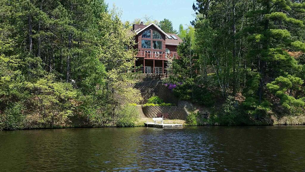 Secluded 4+ Acres Waterfront On Lake Alice