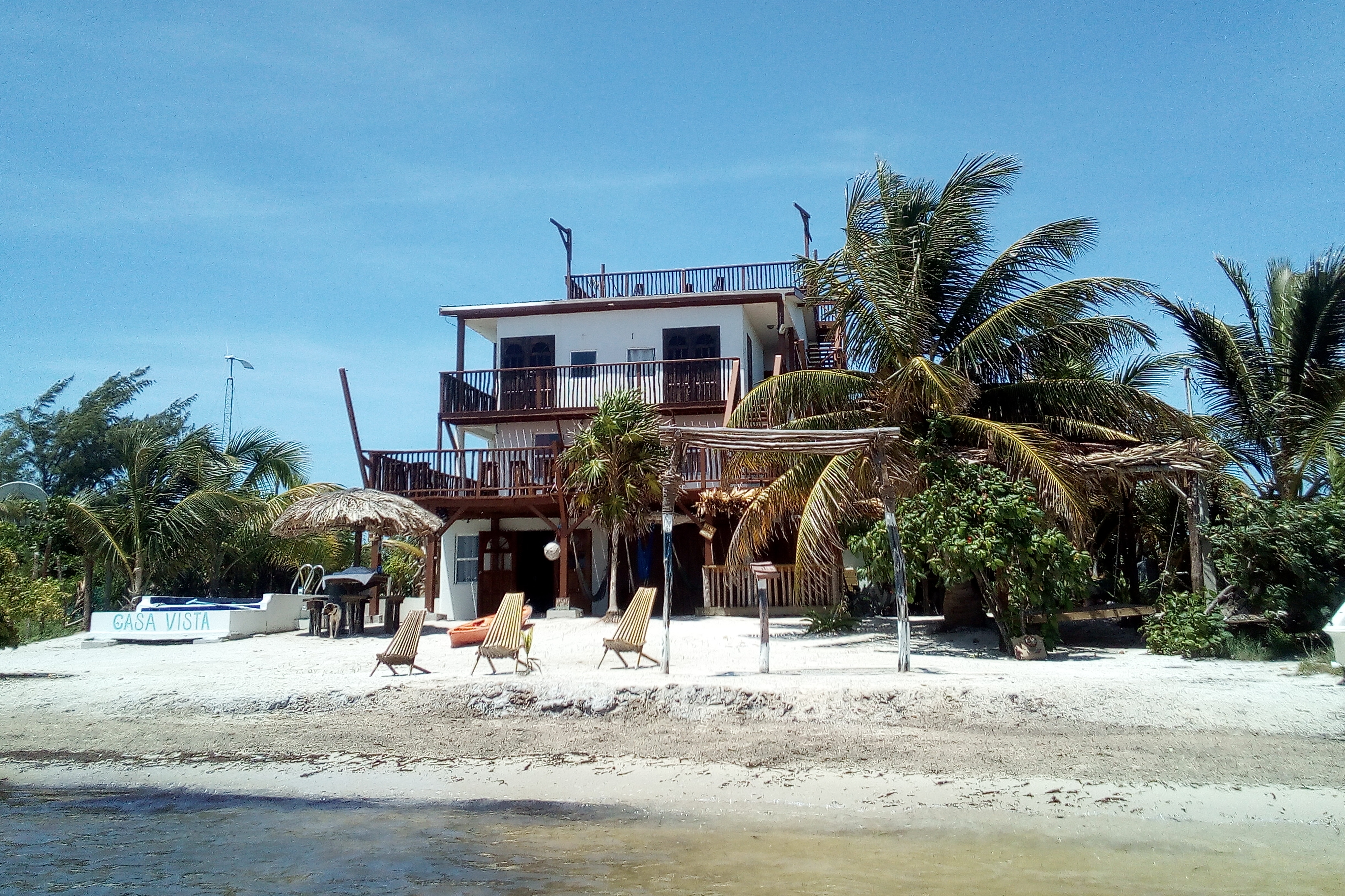 Truly Beachfront Home. Breezy sunrises and sunsets in Belize Islands, Belize