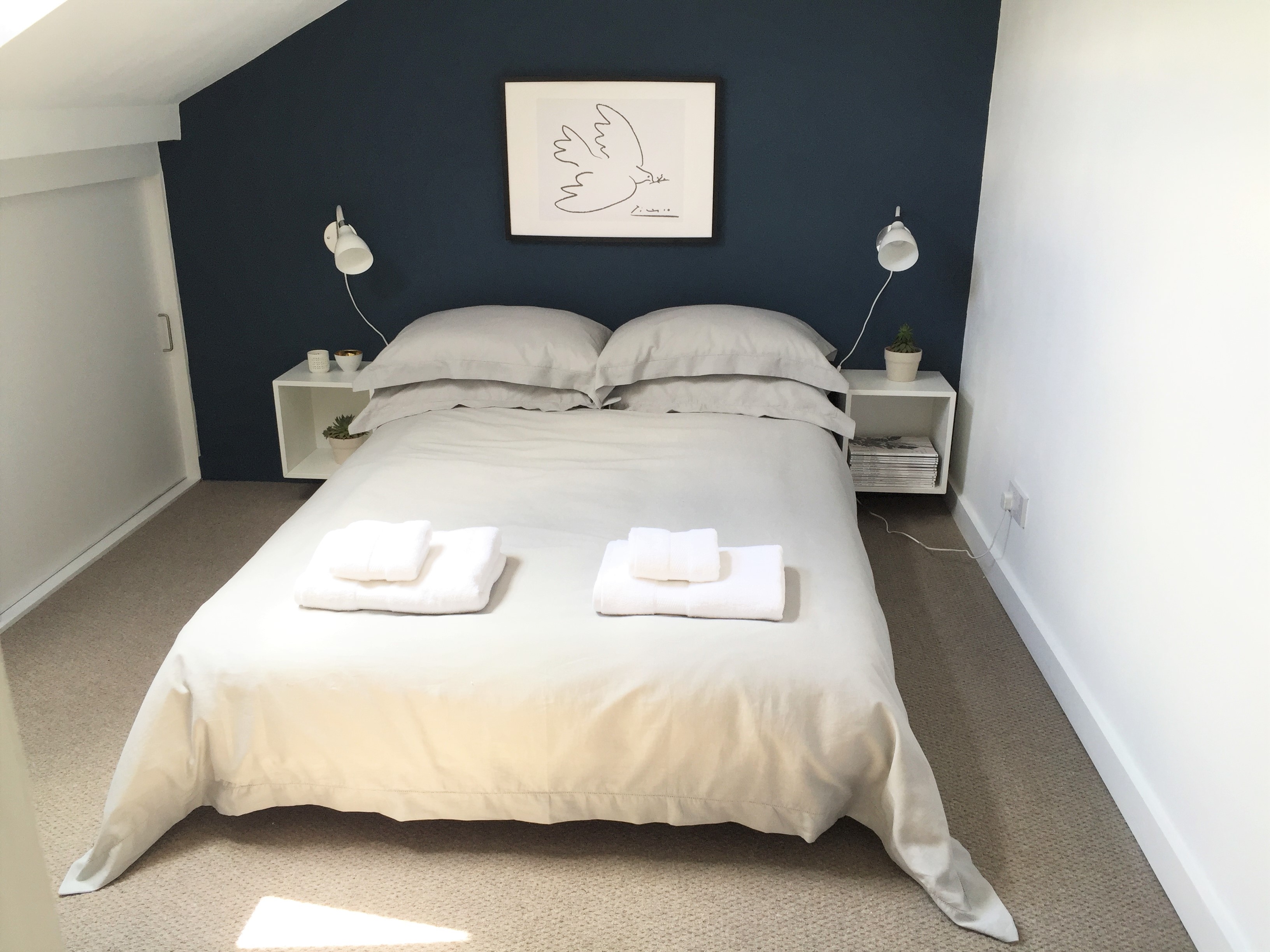 Light attic bedroom with private shower room in Levenshulme, Greater Manchester