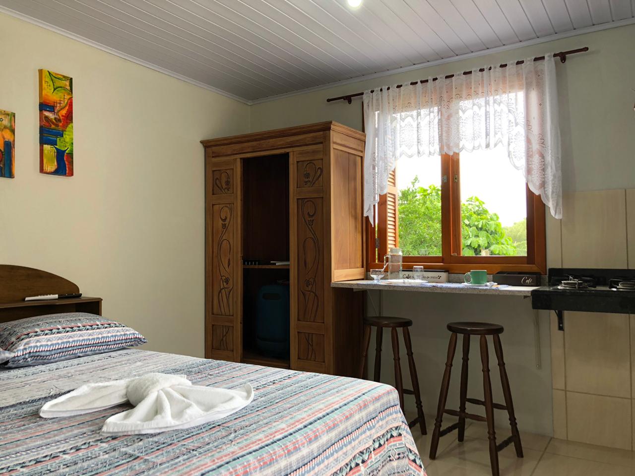 Kitnet with Garage, WiFi & Air Condition