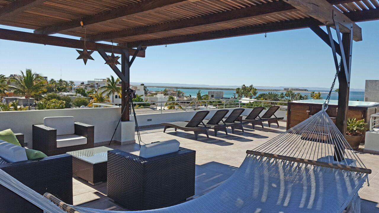 Modern 2 bed condo super close to the beachfront Condominiums for