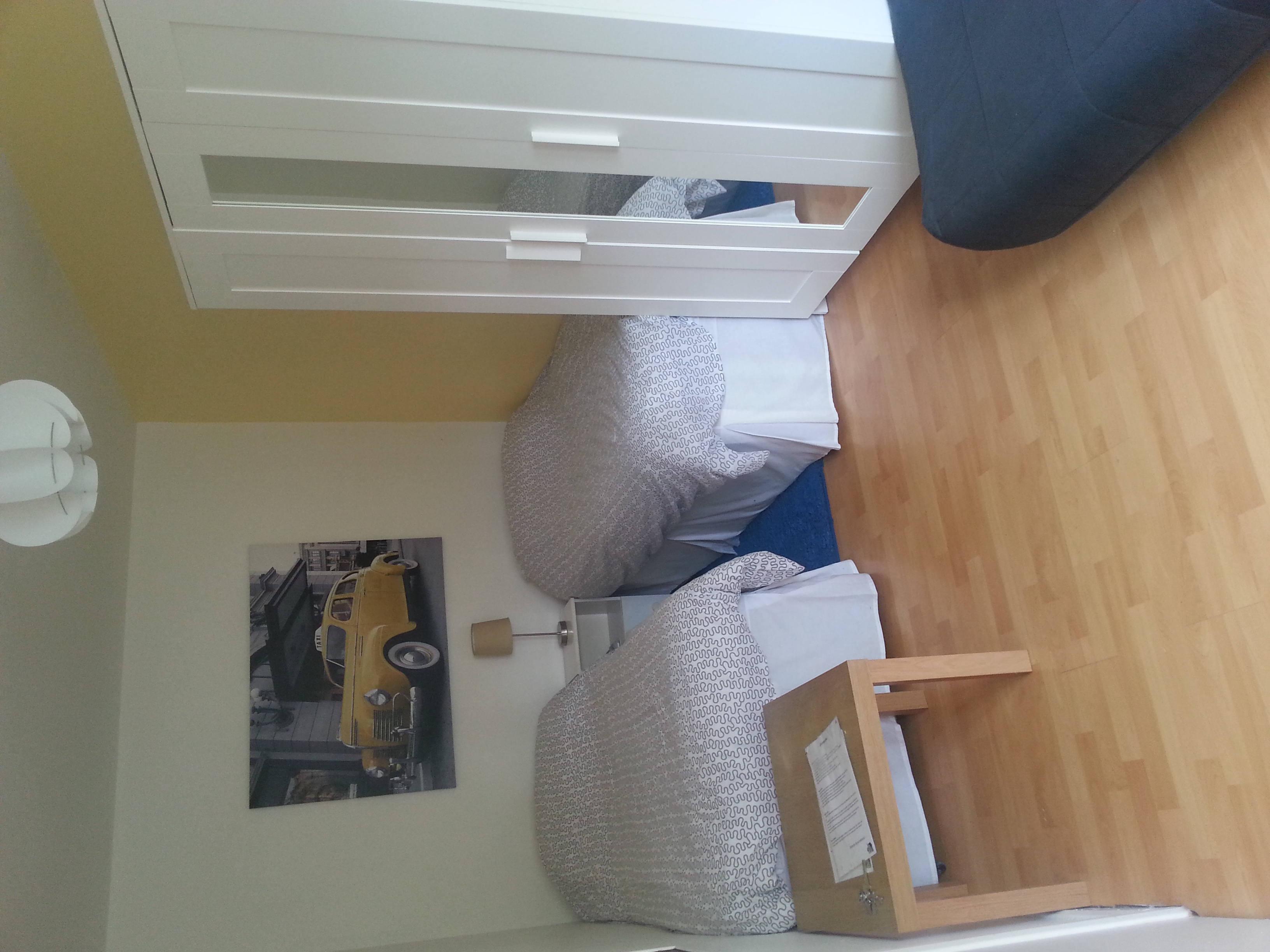 Ideal family room with twin beds and a big sofabed