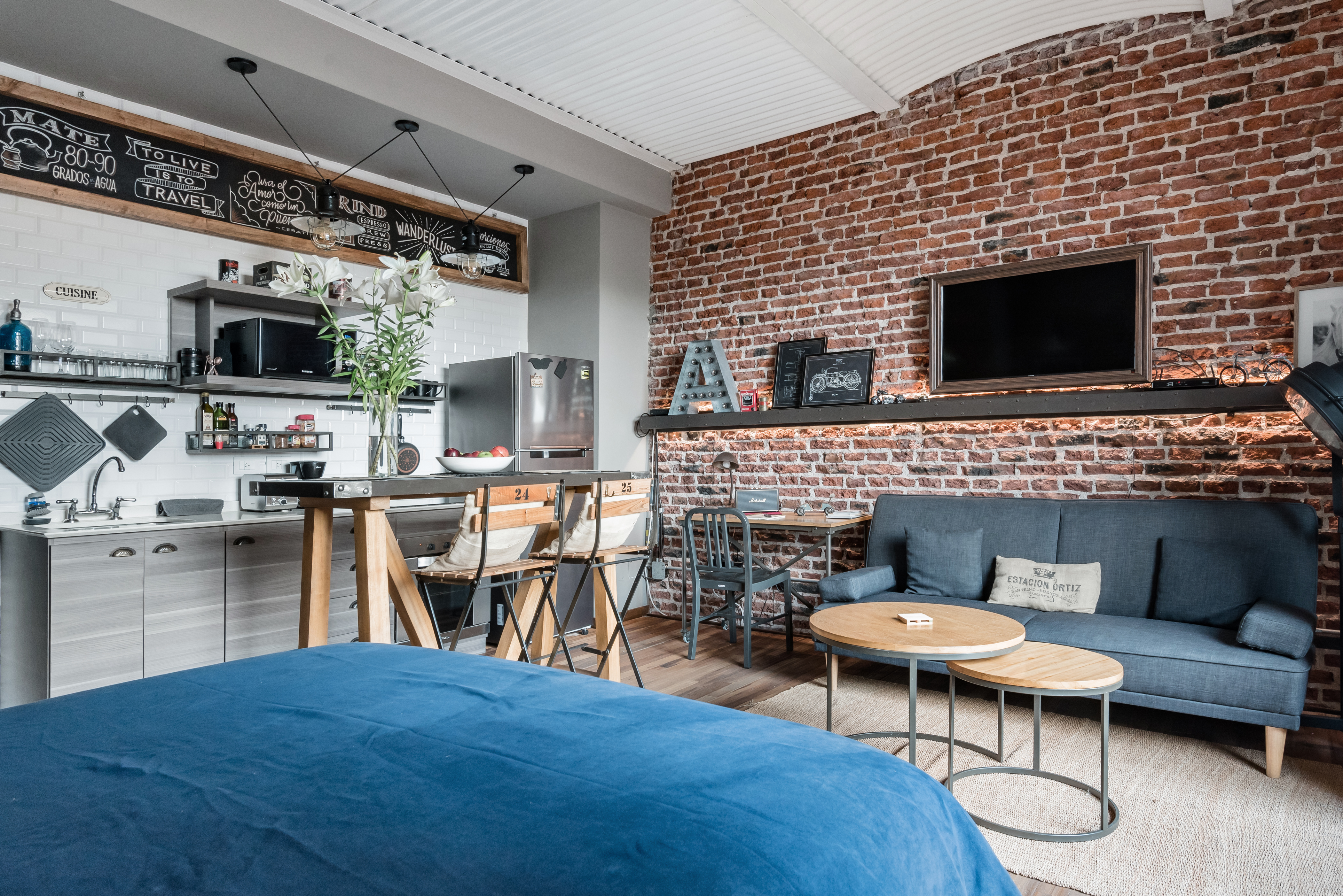 Lounge by the Rooftop Pool at this Modern Studio