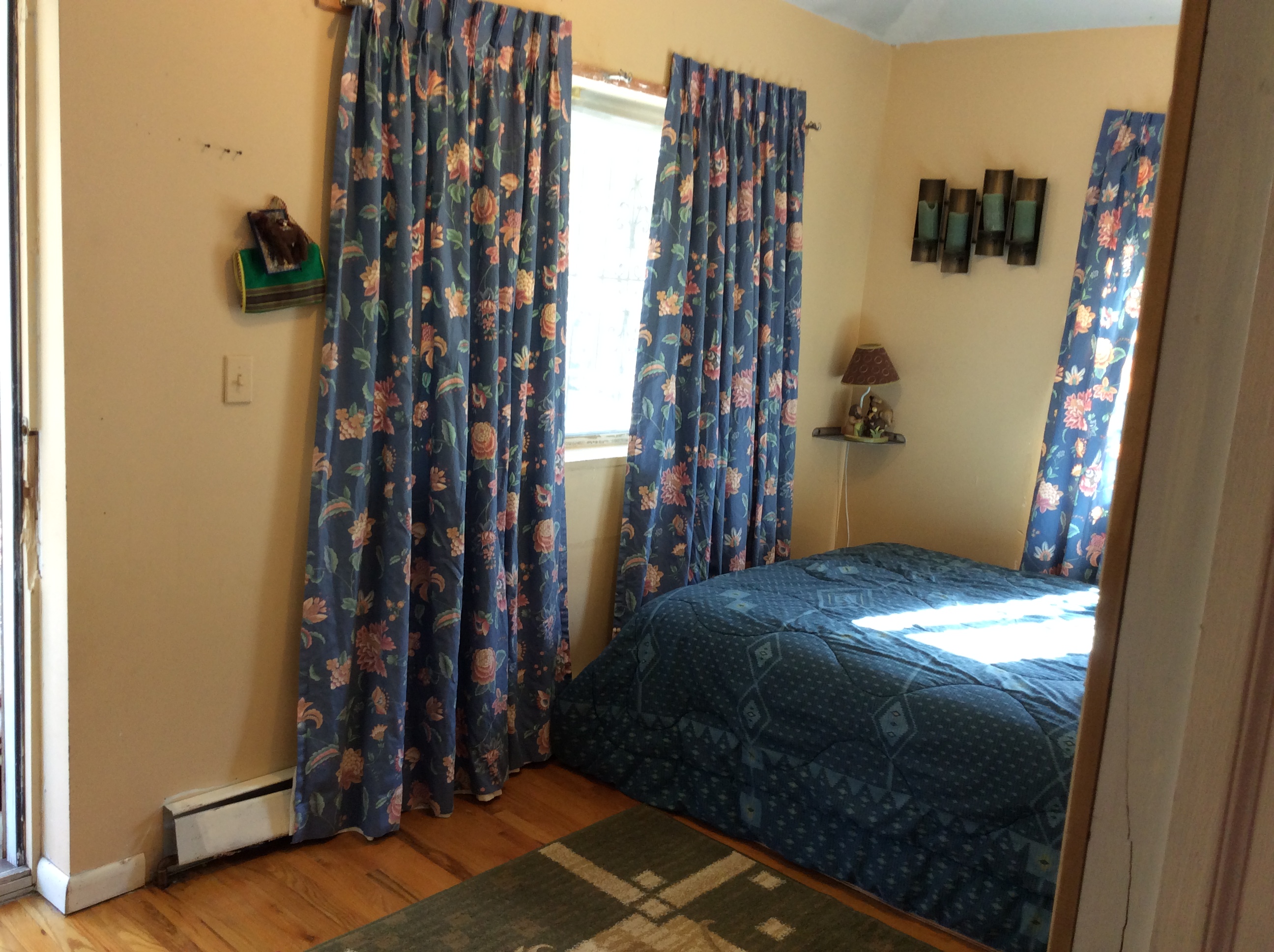 Sunny bedroom with balcony, Queens