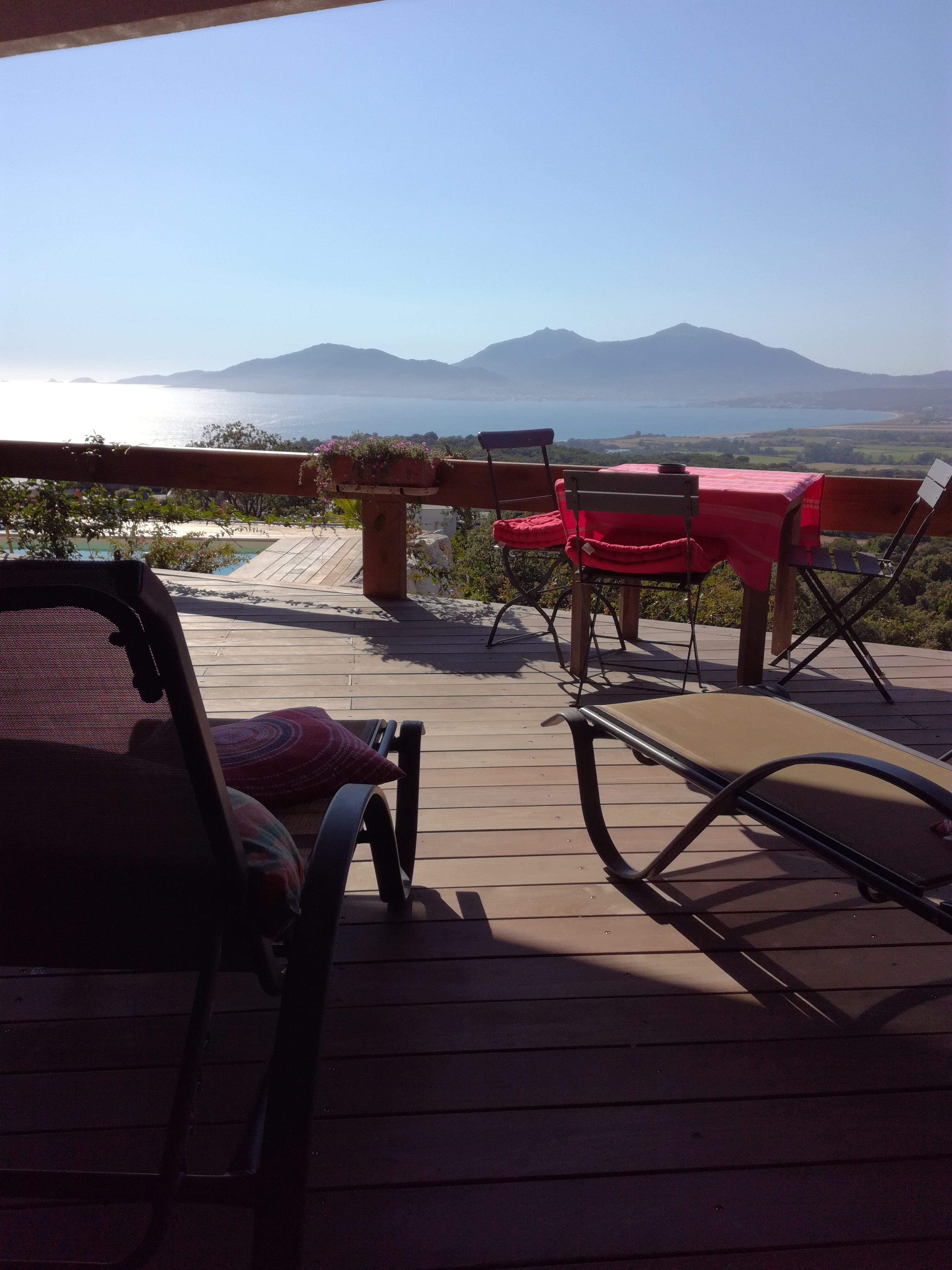 Porticcio studio with pool view.