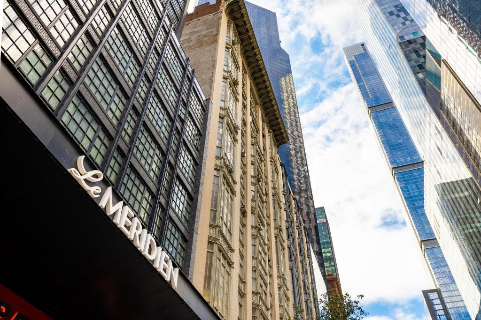 Steps to Central Park | Rooftop Bar. Gym. Dining.